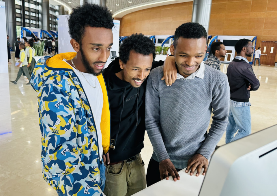 3 men standing together